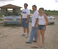 Gary, Warren and Alex pose for the camera on that dirty road
